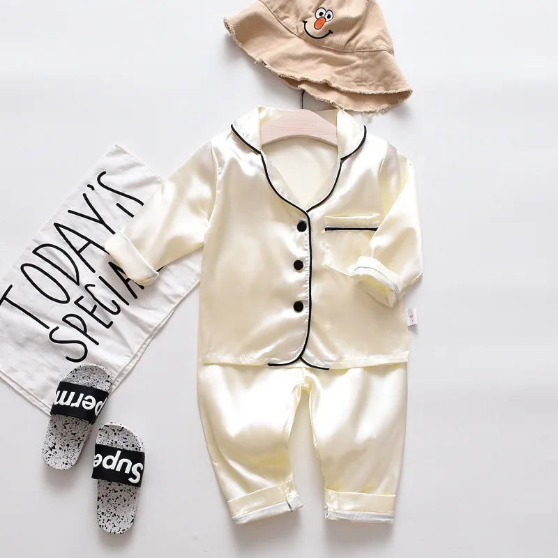 Boys and girls' 0-4-year-old Pajama suit new spring and autumn silk long sleeve trousers Pajama suit comfortable home clothes