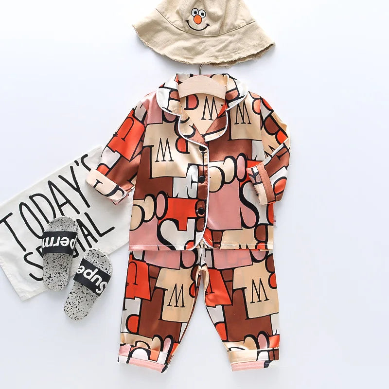 Boys and girls' 0-4-year-old Pajama suit new spring and autumn silk long sleeve trousers Pajama suit comfortable home clothes